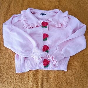 Pink Ruffled Cardigan with Floral Accents